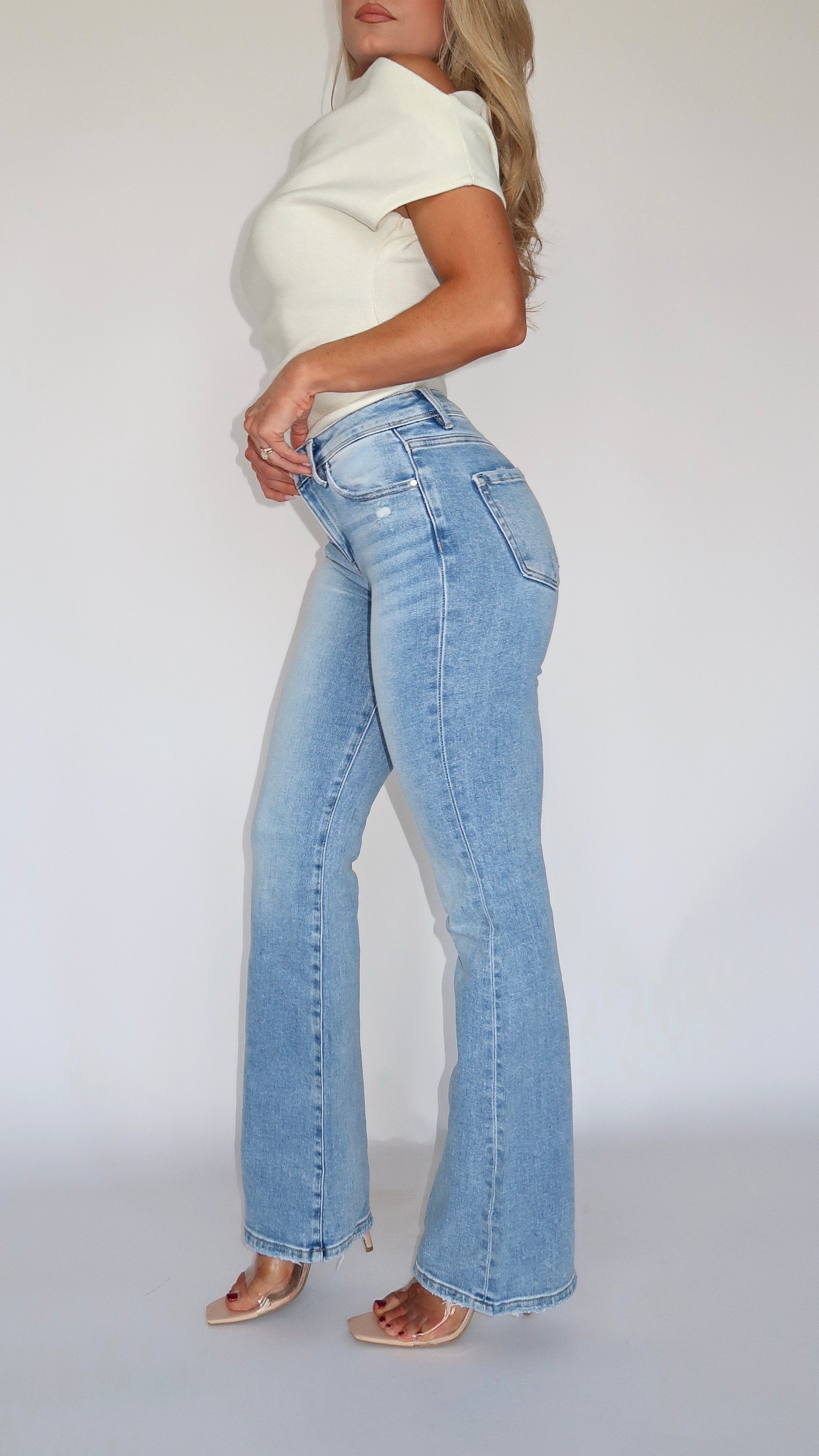 RILEY SUPER HIGH RISE LIGHT WASH BOOTCUT DENIM